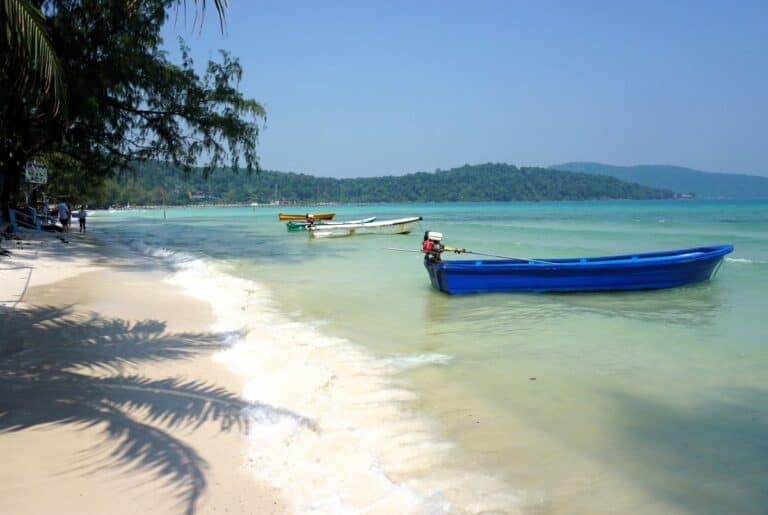 10 day Cambodia itinerary. Palm trees white sand and turquoise waters of Koh Rong Sanloem island
