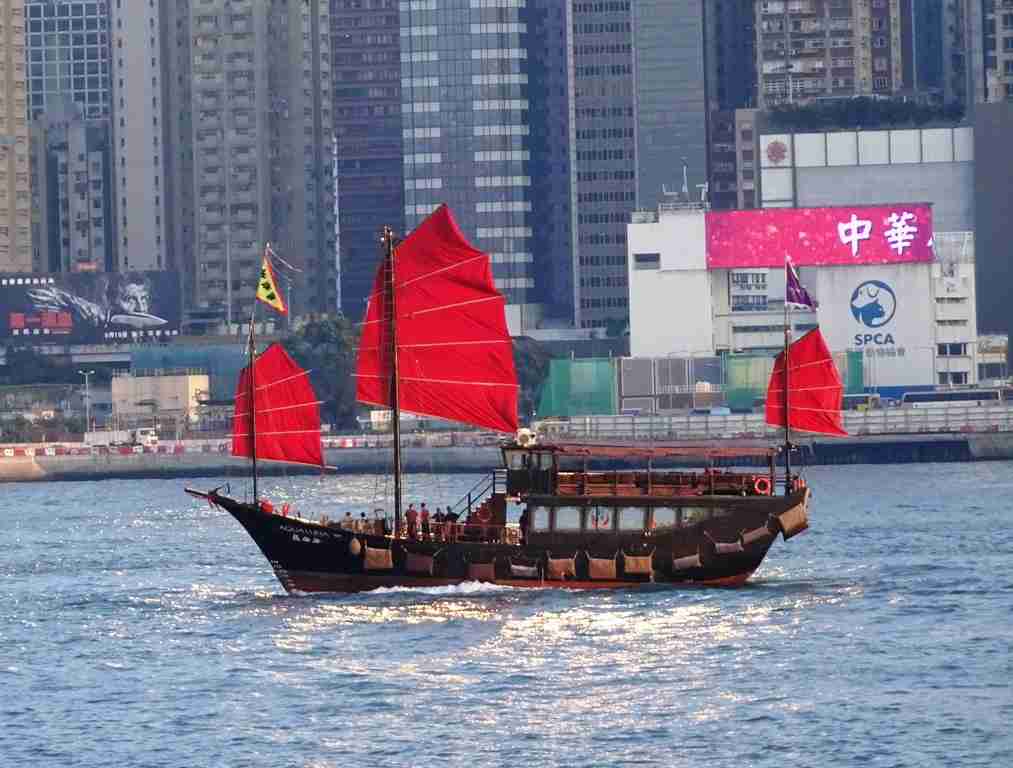 Hong Kong historical landmarks a traditional Chinese junk on Victoria Harbour