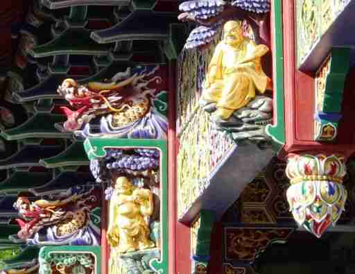 colourful roof tiles and decoration at the Po Lin Monastery