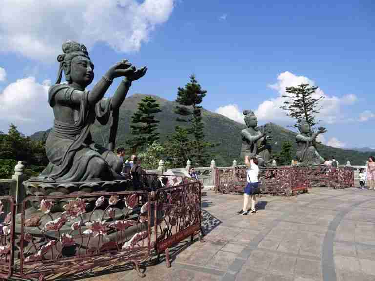 The offering of the Six Divas statues at the Big Buddha statue in Hong Kong