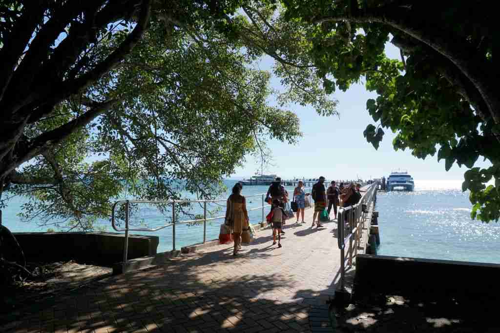 people walking to the ferry at the jetty on Green Island