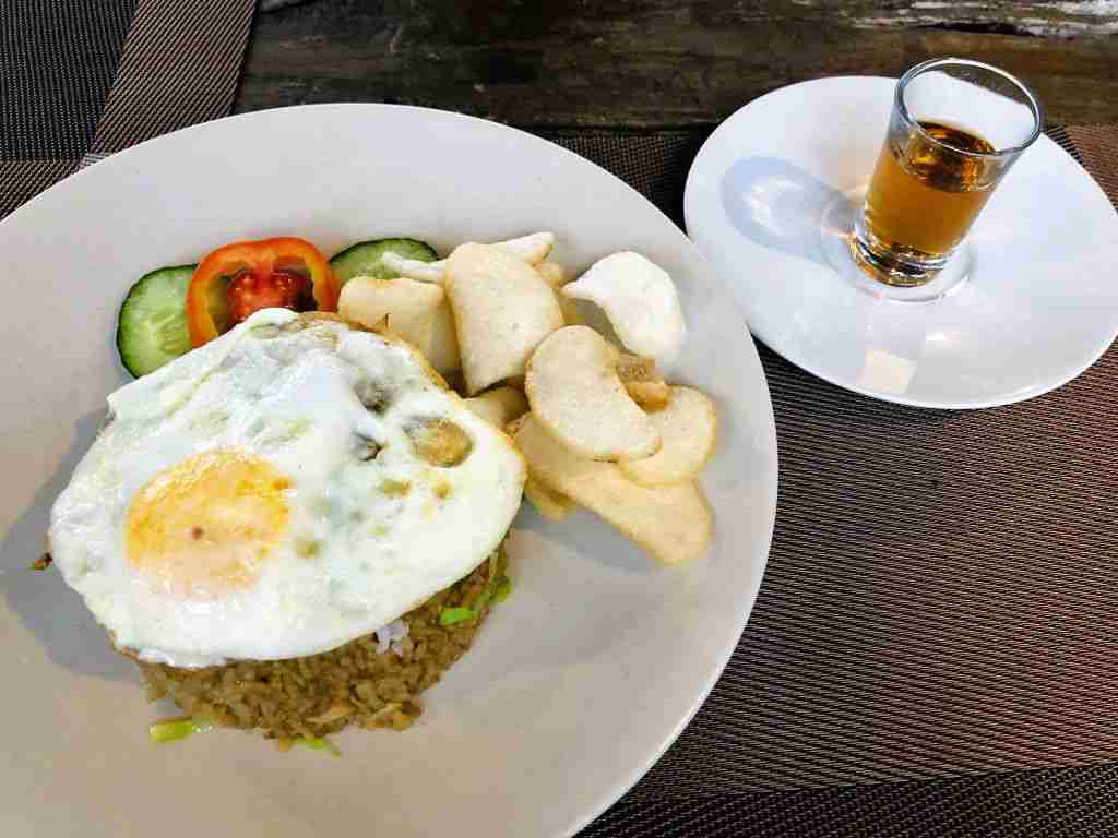 Nasi Goreng with a fried egg and a shot of Arak