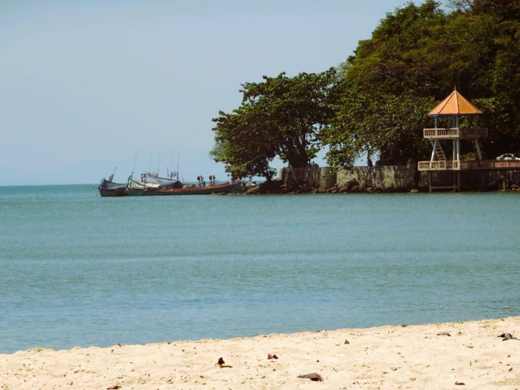 golden sand and calm blue water at Kep beach