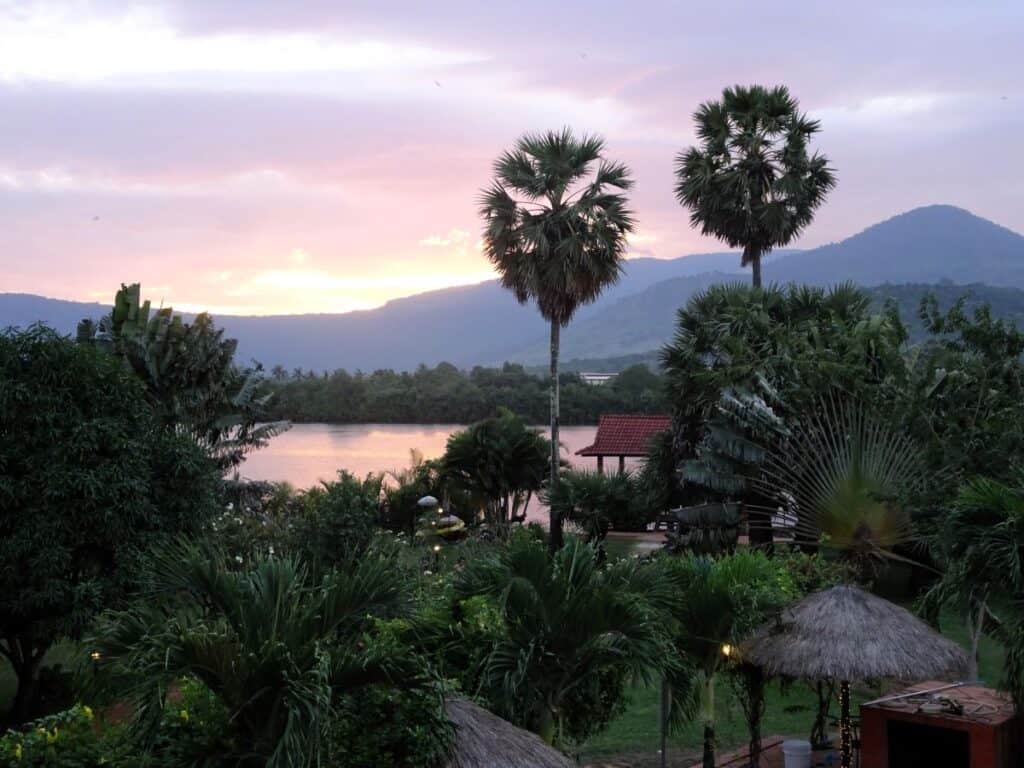 Sunset over the garden at Villa Vedici in Kampot