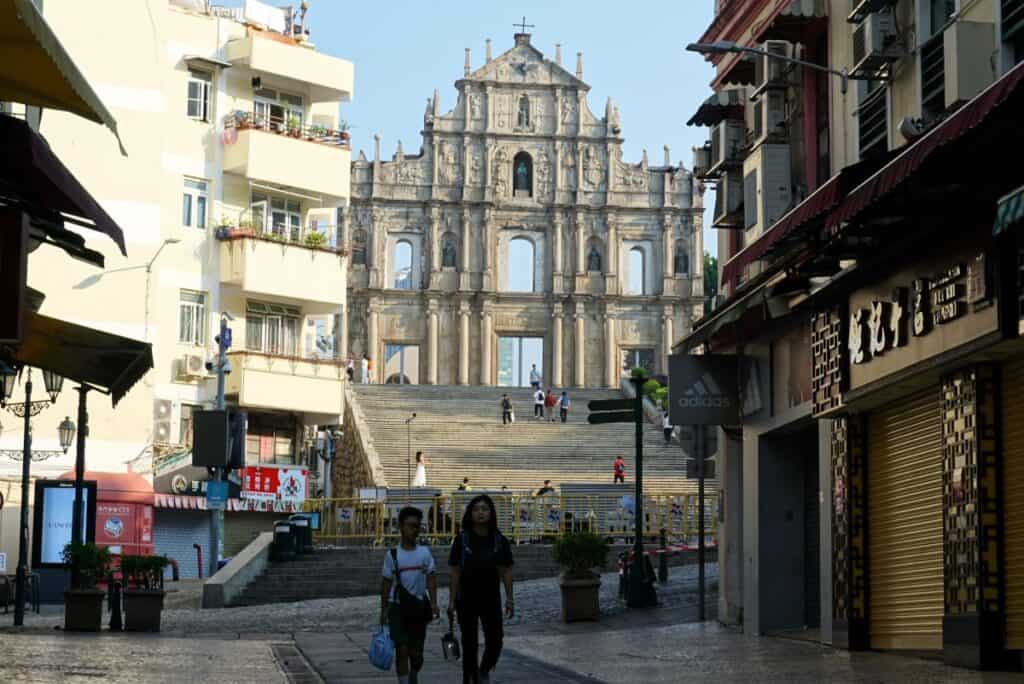 Ruins of St Pauls beside an aprtment black in Macau