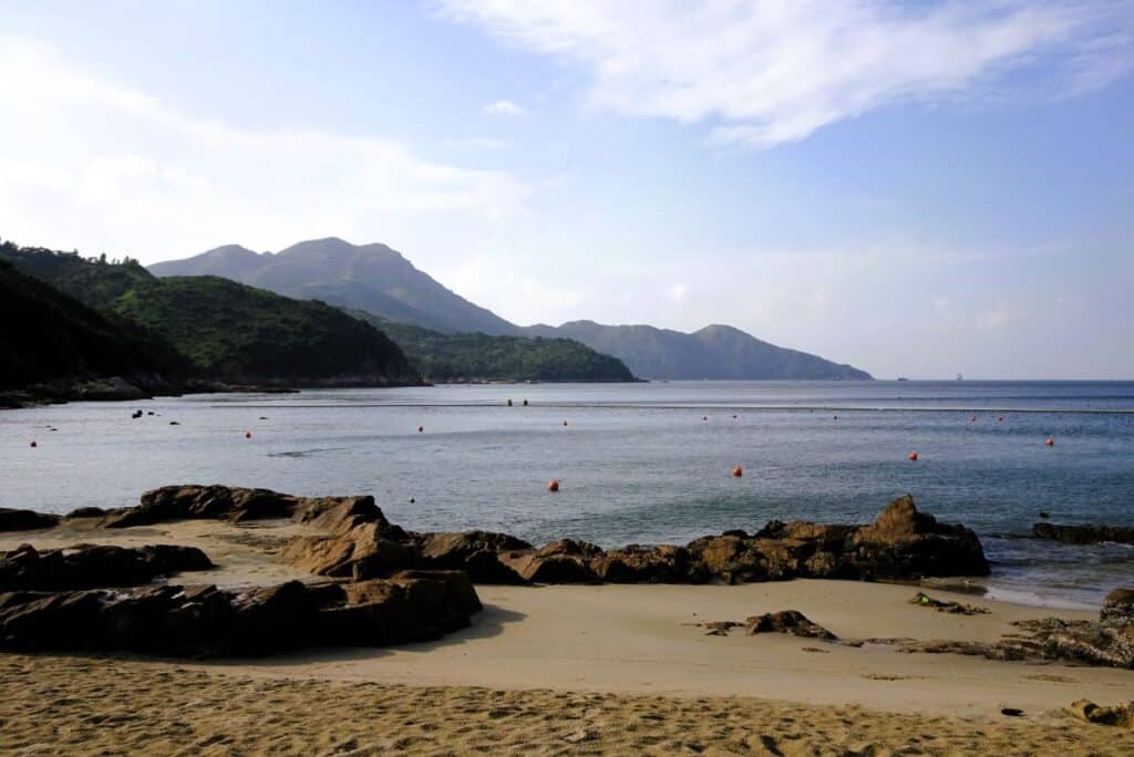 Beautiul beach with distant maountains on Lamma Island Hong Kong