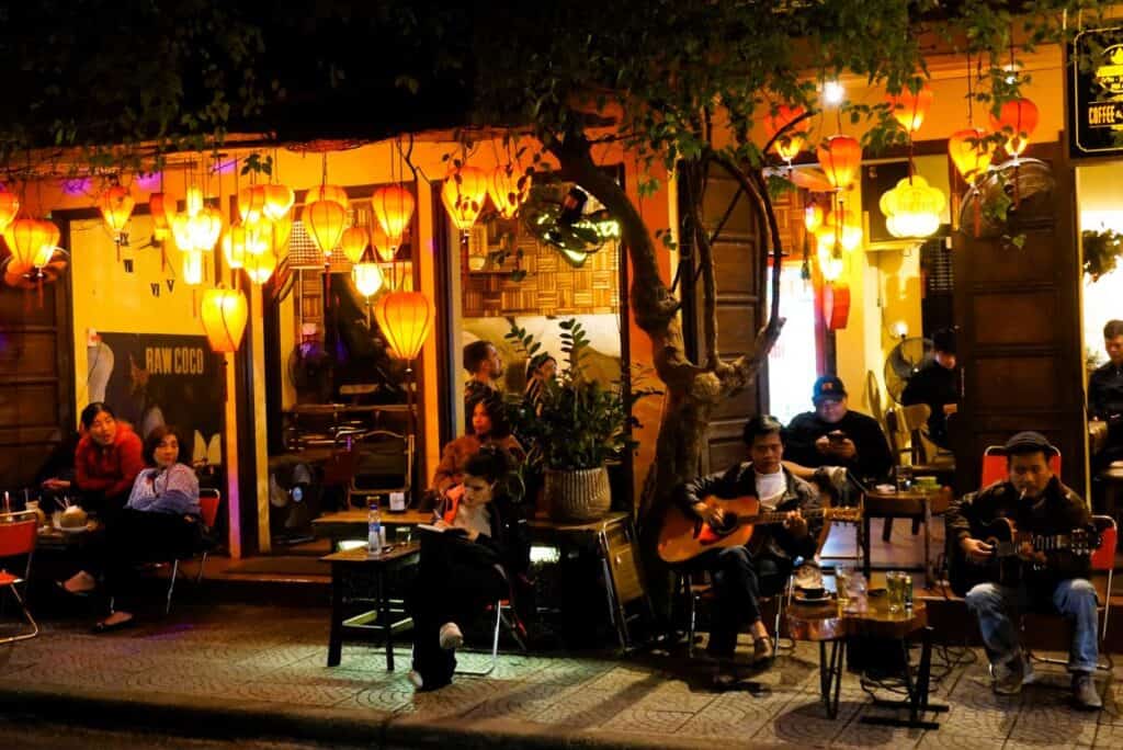 a cafe lit by lanterns at night in Hoi An 