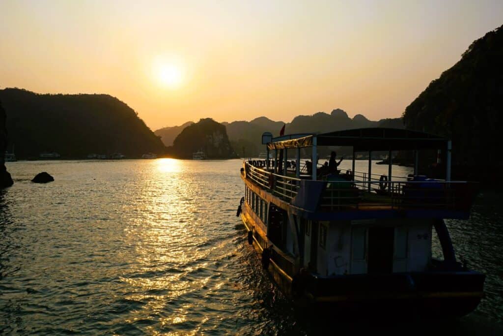 Sunset over the islets on Lan Ha Bay from a cruise boat