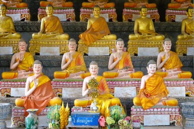 Battambang in Cambodia. Golden Buddha statues at Ek Phnom Pagoda